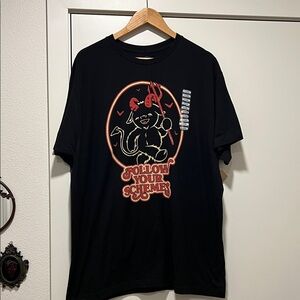 Black Graphic T-Shirt with 'Follow Your Schemes' Design